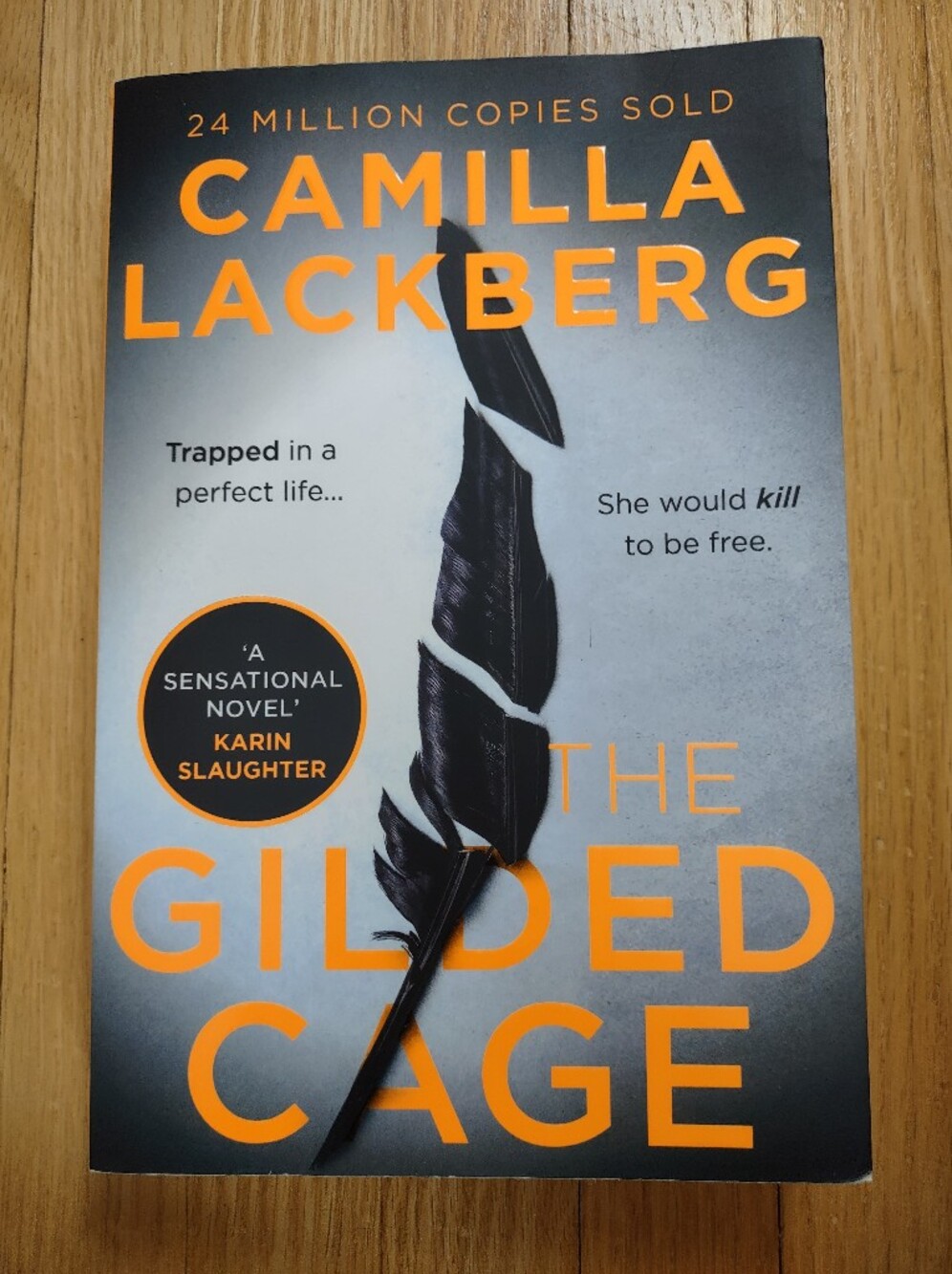 Camilla Lackberg "The Gilded Cage" - Orange & Black Cover